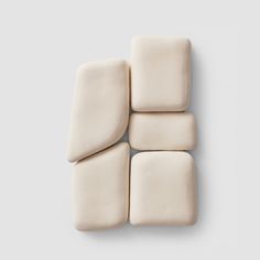 four pieces of marshmallow sitting on top of each other