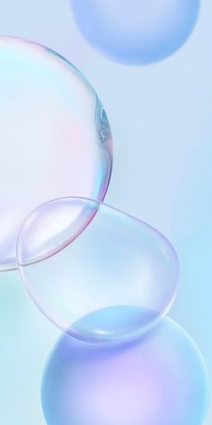 an image of soap bubbles floating in the air on a blue and white background,