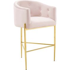 a pink velvet bar stool with gold frame