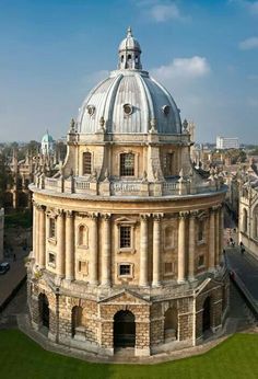 an old building with a dome on top