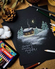 a christmas card with an image of a cabin in the snow and some cotton balls