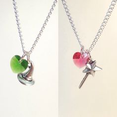 two necklaces with charms attached to them, one is green and the other is pink