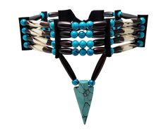 - Made from authentic buffalo bone hairpipe beads, genuine leather, and synthetic turquoise. - 12.5 inches long (without the leather ties). - Hand carved synthetic turquoise arrowhead pendant. - 4 strand traditional tribal bone choker. - 100% Handmade in the USA. We accept custom orders, just message us to discuss your ideas. Bone Choker, Bone Bead Necklace, Handmade Choker Necklace, Arrowhead Pendant, Seed Bead Jewelry Patterns, Native Beading Patterns, Native American Necklace, Beautiful Beadwork, Native Jewelry