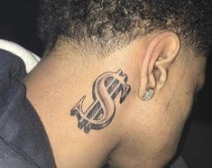 a man with a dollar tattoo on his neck