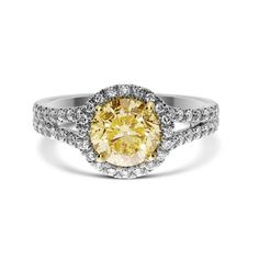 a yellow and white diamond ring