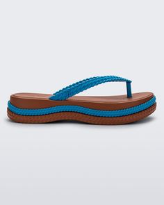 Side view of a brown/blue Melissa Leblon platform flip flop with details that mimic sisal braids on the sole and strap Punk Love, Punk Movement, Leather Duffel Bag, Leather Duffel, Melissa Shoes, Espadrilles Platform, Jelly Shoes, Quirky Design, Mickey And Friends