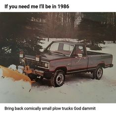 a truck is parked in the snow with a plow behind it and an advertisement on the back