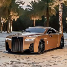 a brown car parked in front of palm trees