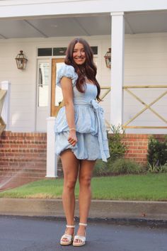 Blue mini dress with a white floral eyelet pattern, front bow tie, two tier ruffle, puff sleeves, and bubble hem details! Model is a 2/4 wearing a small! Athleisure Dress, Cocktail Dress Formal, Shoes Sandals Heels, Summer Bikinis, Blue Mini Dress, Romper Pants, Puff Sleeve, Sweater Top, Unique Style