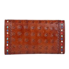 Vintage Blue wallet features hand tooled floral embossed leather and inside features multiple card slots, bill pocket and one zip pocket. Size:8" x 4" Luxury Vintage Wallet For Daily Use, Traditional Bifold Wallets For Everyday Use, Traditional Bifold Wallet For Everyday Use, Traditional Wallets With Card Slots For Everyday Use, Traditional Leather Wallets For Daily Use, Traditional Wallets With Card Slots, Traditional Brown Leather Wallet, Traditional Hand Tooled Wallets For Everyday Use, Milkhouse Candles