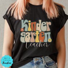 "Welcome your students to Kindergarten with this super cute Kinder teacher shirt. This Kinder Retro tshirt is the perfect Teacher Team Tee. This is such a comfy Tee with a loose fit, perfect to go with your favorite leggings. SHIRT DETAILS We use Bella+ Canvas t-shirts. UNISEX sizing they are meant to have a loose fit. Please refer to our sizing chart in the photos for measurements along with tips on the fit for both ladies and guys. *If you are looking for a different fit, tank top, sweatshirt 4th Grade Teacher, Third Grade Teacher Shirts, 3rd Grade Teacher, Kindergarten Teacher Shirts, Favorite Leggings, Teacher Team, Teacher Tees, 70s Style, Fourth Grade