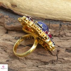 Tanzanite Gemstone Ring, Ruby Gemstone Ring, Sapphire Gemstone Ring, Pave Diamond Jewelry, 925 Silver Jewelry, Gold Vermeil Jewelry, Gifts Gross Weight: 16.34 gram Diamond Weight: 1.20 cts Gemstone Weight: 16.85 cts Ring Size: 38X34 MM NOTE:- All The Products Are Designed And Manufactured In My Workshop By Me & My Team. Shown Products Are Purely Handmade. Custom Orders Are Open Handly Accepted. We Are the Perfect Choice For Any Custom Jewelry Manufacturing. For Bulk Orders Please Message me. Exquisite Multi-stone Cluster Ring Gift, Exquisite Multi-stone Gemstone Ring, Exquisite Rings With Gemstone Accents, Fine Jewelry Ruby Ring With Stones, Exquisite Stone Setting Rings For Gift, Exquisite Rings With Stone Setting For Gifts, Exquisite Rings With Stone Setting As Gift, Exquisite Gemstone Rings, Exquisite Gift Rings With Stone Setting