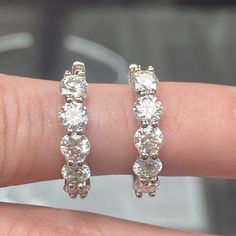 2 Carat Diamond Moissanite Hoop Earrings Set In 925 Sterling Silver With Rhodium Finish. These Stunning Hoops Are Genuine Moissanite And Tests As Diamond On All Testers! Have A Higher Refractive Index Than A Diamond, So They Sparkle And Have More Fire & Brilliance Than A Natural Diamond!! Each Earring Has 5 Stones Weighing 0.20 Carats Each, For A Total Of 1 Carat Per Earring, 2 Carat Total Weight For Both Earrings!! Certificate Of Authenticity, Warranty, And Gra Gem Report Comes With These Stunn Anniversary White Sterling Silver Hoop Earrings, White Sterling Silver Hoop Earrings For Anniversary, Fine Jewelry White Hoop Earrings With Prong Setting, Anniversary Small Hoop Earrings With Prong Setting, Small Hoop Earrings With Prong Setting For Anniversary, Vvs Clarity Round Diamond Earrings For Anniversary, Vvs Clarity Diamond Earrings For Anniversary, Aaa Quality Diamond White Round Diamond Earrings, Formal Sterling Silver Aaa Quality Hoop Earrings