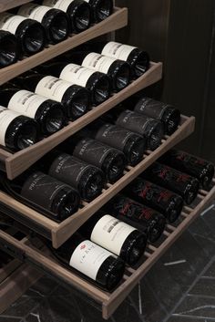 a wine rack filled with lots of bottles