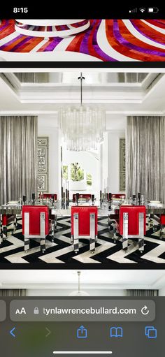 the interior of a restaurant with red and white chairs