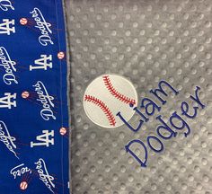 a close up of a cloth with a baseball on it and the words los angeles dodgers