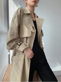 This belted midi-length trench coat is an elegant and sophisticated wardrobe staple for the modern woman. With a stylish gun flap, flap pockets, and true-to-size fit, it's a timeless classic that can be dressed up or down for a variety of occasions. Long sleeves with belted cuffs Notched lapels Flap pockets Lined Cotton, polyester Machine wash, tumble dry Women's trench coat Item #310312 Size info XS=US2=UK6=EU32 S=US4-6=UK8-10=EU34-36 M=US8-10=UK12-14=EU38-40 ★★ It would be helpful if you provi Elegant Beige Earrings For Spring, Women's Trench Coat, Long Trench, Long Trench Coat, Flower Stud Earrings, Layered Design, Flower Stud, Trench Coats Women, Silver Flowers