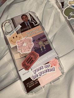 a cell phone case with stickers on it