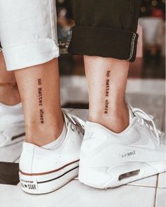 two people with matching tattoos on their legs, one has the words do not enter here