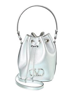 About The Brand: Signature Elegance With A Modern Aesthetic. Made In Italy Vlogo Signature Mini Leather Bucket Bag In Silver Leather And Silver-Tone Hardware With Vlogo Accent Interior Design Details: Leather Lining Measures 5In Wide X 7In High X 5In Deep Top Handle Drops 6In Removable Shoulder Strap Drops 23In Drawstring Closure Please Note: All Measurements Were Taken By Hand And Are Approximate; Slight Variations May Occur. Our Products Are 100% Genuine. In Some Cases We Purchase Merchandise From Trusted Independent Suppliers And Not Directly From The Brand Owner. In All Cases We Stand By The ity Of Every Product Sold On Our Site. Luxury Bucket Bag With Silver-tone Hardware For Everyday Use, Luxury Chic Bucket Bag With Silver-tone Hardware, Elegant Luxury Bucket Bag With Silver-tone Hardware, Luxury Silver Formal Bucket Bag, Luxury Evening Bucket Bag With Silver-tone Hardware, Luxury Silver Bucket Bag For Formal Occasions, Luxury Bucket Bag With Silver-tone Hardware Shaped As Satchel, Luxury Silver-tone Hardware Pouch Bucket Bag, Interior Design Details