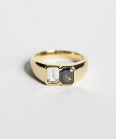 a close up of a ring on a white surface