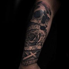 a man's arm with a skull and cross tattoo on it that says never to miss you