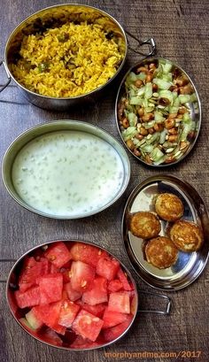 there are many different types of food in bowls on the table, including rice and watermelon