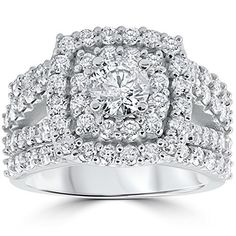 a white gold diamond ring with two rows of diamonds