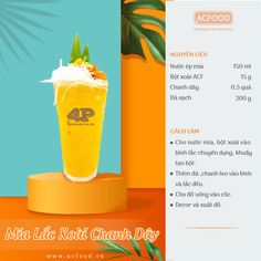 an advertisement for a drink with oranges on the side and palm leaves in the background