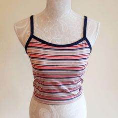 "Sweet vintage Champion sports crop top. Colorful stripes,blue suspenders and a edge around the sleeve. It has a logo printed at the end. Fabric is stretchy. It is padded on the chest,see last image. In excellent vintage condition. Tag size: US M,but smaller,best fits to size US XS/S,check the measures. Materials: polyester 88%,spandex 12% Label: Champion  Measures taken flat,one side bust 36.5 - 48 cm = 14,37 - 18,90\" waist 34 - 37 cm = 13,38 - 14,57\" length with suspenders about 43 cm = 16,9 Striped Fitted Cropped Top, Fitted Striped Cropped Top, Sporty Fitted Top With Straps, Sporty Cropped Tops With Adjustable Straps, Summer Sports Tops With Contrast Stripes, Summer Sports Top With Contrast Stripes, Spring Striped Sports Tops, Striped Fitted Tank Top With Tank Straps, Blue Sporty Top With Adjustable Straps