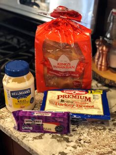 ingredients to make peanut butter and jelly sandwich displayed on counter