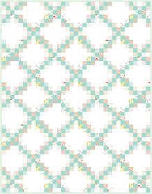 a white and green quilt with small squares on the front, in different shades of blue