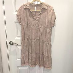 Zenana Dress. Nwot. Size S/M. Color Was Listed As Ash Mocha. Washed Fabric, Almost Gives A Taupe/Blush Color Vibe. V-Neck With Color. Sewn Cuff Sleeve. Pockets. Raw Edge. 25% Linen, 75% Rayon. Flowy Fit. Casual Boho Short Sleeve Dress For Brunch, Casual Boho Dress With Short Sleeves For Brunch, Beige V-neck Rayon Dress, Beige Shift Mini Dress With Short Sleeves, Short Sleeve Rayon Mini Dress For Day Out, Casual Beige Tiered Dress, Casual Boho Dress With Short Sleeves In Rayon, Casual V-neck Tiered Dress For Daywear, Casual Rayon Tunic Dress