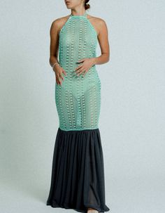 A body hugging maxi dress with an open back, made from mint green, see-through cotton crochet with a Dark grey flowing chiffon hem. Classic cut with an edge, finished with beautiful detailing and adjustable strings. Take it to the beach, take it to a wedding , take it to a beach wedding. it works. Bohemian Stretch Dress For Beach Party, Stretch Crochet Maxi Dress For Vacation, Stretch Maxi Length Crochet Dress For Vacation, Summer Beach Long Crochet Dress, Green Maxi Crochet Dress For Spring, Chic Green Crochet Summer Dress, Chic Green Crochet Dress For Summer, Fitted Green Beach Dress Cover-up, Fitted Green Maxi Dress For Beach Cover-up