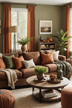 a living room filled with lots of furniture and pillows on top of a table in front of a window