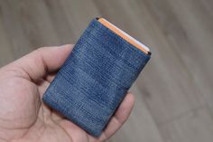 SIZE:- 90 mm (H) x 60 mm (W)- 3,55" (H) x 2,36" (W) Our vegan denim minimalist wallet is the perfect balance of style and sustainability. Made from high-quality, durable materials, this wallet is designed to carry your essentials without weighing you down. The minimalist design features a sleek, slim profile that easily fits into your pocket, while the interior provides plenty of space for cards, cash, and other essentials. The denim material is not only stylish but also eco-friendly, making thi Casual Everyday Trifold Wallet, Blue Trifold Wallet With Card Slots, Casual Blue Bifold Wallet, Casual Blue Wallet For Gift, Casual Blue Rfid Blocking Wallets, Blue Casual Wallets With Rfid Blocking, Casual Blue Wallets With Rfid Blocking, Denim Wallet, Mens Wallets