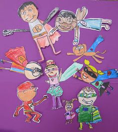 children's paper cut out of different characters on a purple background with scissors and pencils