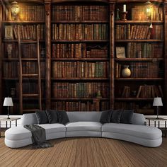 a large couch sitting in front of a bookshelf