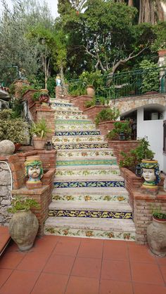 a set of steps that are next to some plants