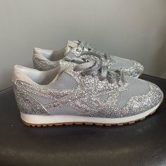 Sliver Glittery Tennis Shoes - Purchased From Online Boutique (Couldn’t Return) - Size 7.5 - Nwot Make A Offer! No Reasonable Offer Will Be Rejected!! Metallic Glitter Lace-up Sneakers, Silver Sneakers With Glitter Accents For Spring, Trendy Silver Sneakers With Bling, Silver Glitter Casual Sneakers, Trendy Silver Bling Sneakers, Silver Party Sneakers For Spring, Spring Silver Party Sneakers, Party Sneakers With Bling And Lace-up Design, Casual Silver Sparkling Sneakers