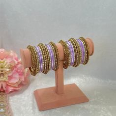 This includes 2 half stacks of lilac bangle set includes antique gold mixed with lilac dot metal bangles.  Avialable in 12 different colours to choose from ✨ Ready to ship 📦 Purple Bangle For Wedding, Adjustable Purple Bangle For Festive Occasions, Traditional Purple Bracelets For Festive Occasions, Traditional Purple Bracelet For Festive Occasions, Traditional Purple Bangle Bracelets, Traditional Adjustable Purple Bangle, Traditional Purple Bangle For Festive Occasions, Festive Traditional Purple Bangle, Festive Purple Bangle