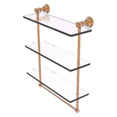 three tiered glass shelf with gold accents and brass fittings on the bottom, against a white background