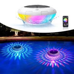 an inflatable pool with lights on it and a cell phone next to it