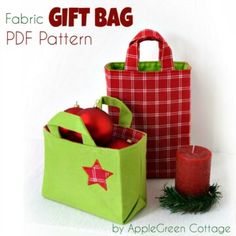 two bags with christmas ornaments in them and the text, fabric gift bag pdf pattern by applegreen cottage