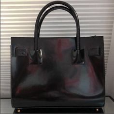 Alberta Di Canio Tote. Genuine Patent Leather. Black With Gold Hardware. Large Interior With 2 Deep Compartments Separate By A Large Zip Compartment. Accordion Sac De Jour Style. 3 Slip & 1 Zip Pocket. Made In Italy. Also Available In Grey. Rough Dimensions: 11”H X 13.5”L W/ 5” Handles Previously Used. Some Fairly Minor Signs Of Wear (See Last Photosmore Photos In Separate Listing). Does Not Have Original Dust Bag. Price Is Pretty Firmsorry! Shipping Discounts Can Be Provided On A Closet Clear Out Day (Usually Fridays And Sundays) Upon Request! Color Block Tote Bag, Color Block Tote, Grey Tote, Suede Tote, Genuine Leather Totes, Large Leather Tote, Leather Handbags Tote, Leather Wristlet, Large Tote Bag