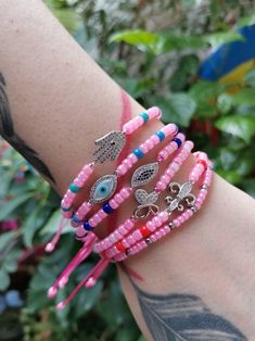 Adjustable Pink Beaded Evil Eye Bracelet, Pink Beaded Evil Eye Bracelet, Pink Beaded Evil Eye Bracelet With Round Beads, Pink Beaded Bracelets For Festival, Pink Bracelets With Spacer Beads For Festival, Summer Jewelry Beach, Bracelet Butterfly, Pink Beaded Bracelets, Evil Eye Hamsa