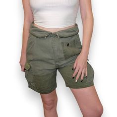 Brand: Isabel Marant Descrip: Army Green Foldover Cargo Shorts Size: 1 ((Small)) Approx Msmts: Flat Waist: 16" Inseam: 6" Rise: 12" Fabric: 100% Cotton Condition: Pre-Owned, Very Good No Notable Flaws Model Fits Many Sizes But Typically 4-6/27-28 In Pants. M In Tops, 34c. 5’5” Will Ship Within 1-2 Biz Days Reasonable Offers & Bundles Welcome! Army Zipper Waist Detail Olive Green Shorts Summer Preppy Military Shorts, Olive Green Shorts, Preppy Summer, Shorts Summer, Model Fits, Green Shorts, Summer Shorts, Isabel Marant, Cargo Shorts