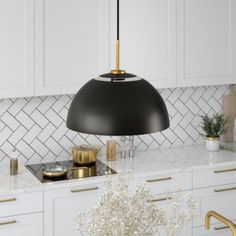 Clean lines and a mid-century modern design combine to create this unique pendant light fixture. The 16" wide round shade features cut-outs along the top so light can reflect up towards your ceiling as well as through the traditional downlight. The adjustable 8 foot cord allows you to hang the pendant at your desired height. Its unique design sets this pendant apart and is sure to be an eye-catching statement piece in your foyer, kitchen, or dining room. | Hinkley & Carter Jordyn Pendant Unique Pendant Lights, Cfl Bulbs, Black Pendant Light, Home Decor Lights, Unique Pendant, Mid Century Modern Design, Chandelier Pendant Lights, Brushed Brass, Ceiling Light Fixtures