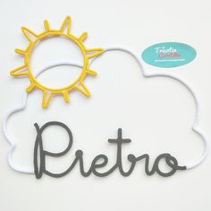 the word preto written in black and yellow on a white background with a sun above it