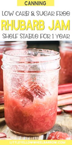 a jar filled with rhubarb jam on top of a wooden table